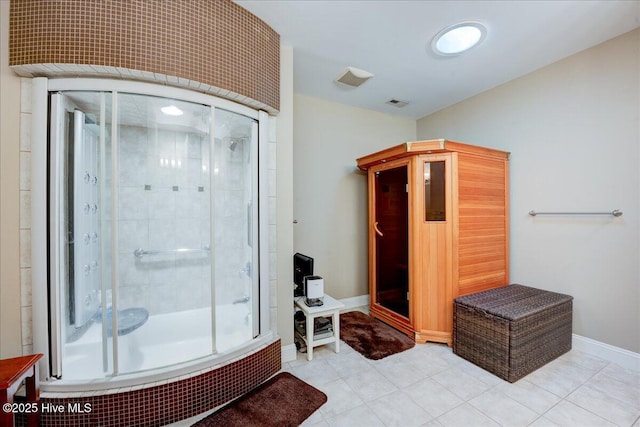 100 Knollwood Ct, New Bern, NC 28562 - bathroom featuring tiled shower / bath and tile patterned flooring