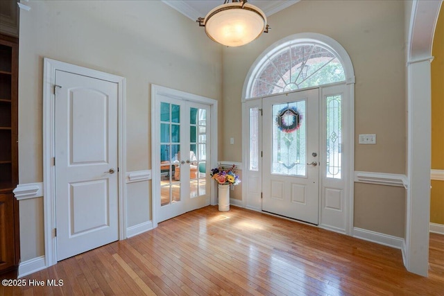 100 Knollwood Ct, New Bern, NC 28562 - entryway with french doors, light wood-style flooring, and ornamental molding