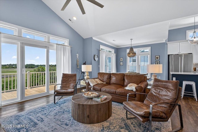 277 E Second St, Ocean Isle Beach, NC 28469 - living area featuring dark wood-type flooring, ceiling fan, crown molding, high vaulted ceiling, and recessed lighting