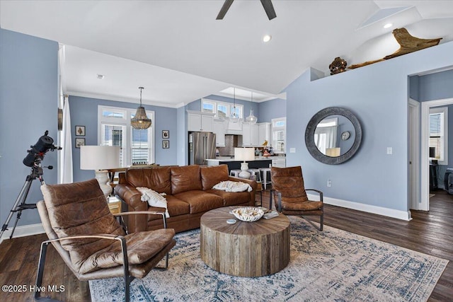 277 E Second St, Ocean Isle Beach, NC 28469 - living room with a ceiling fan, dark wood-type flooring, crown molding, vaulted ceiling, and recessed lighting