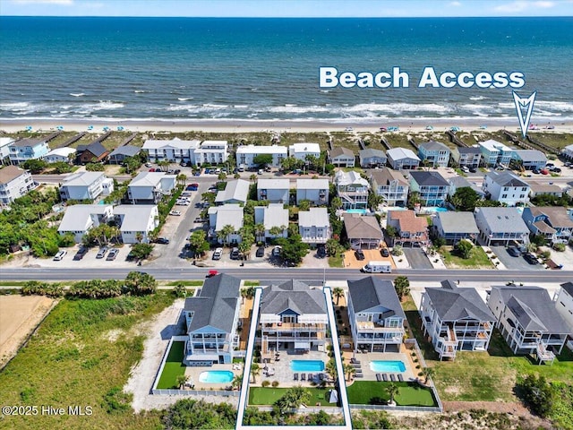 277 E Second St, Ocean Isle Beach, NC 28469 - aerial perspective of suburban area with unending shoreline