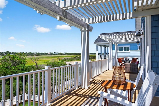 277 E Second St, Ocean Isle Beach, NC 28469 - balcony featuring a pergola