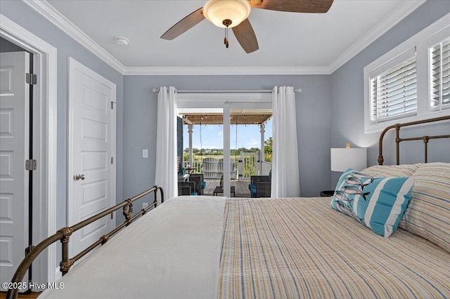 277 E Second St, Ocean Isle Beach, NC 28469 - bedroom featuring access to exterior, multiple windows, ornamental molding, and ceiling fan