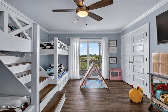 277 E Second St, Ocean Isle Beach, NC 28469 - bedroom featuring crown molding, wood finished floors, and ceiling fan
