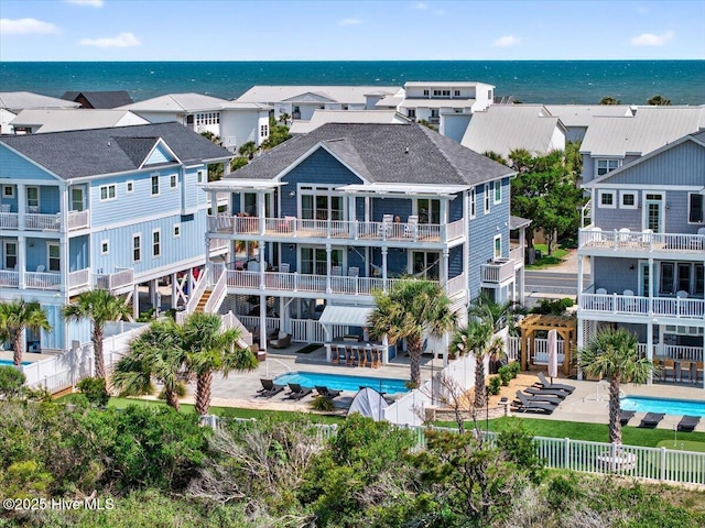 277 E Second St, Ocean Isle Beach, NC 28469 - aerial perspective of suburban area with a nearby body of water