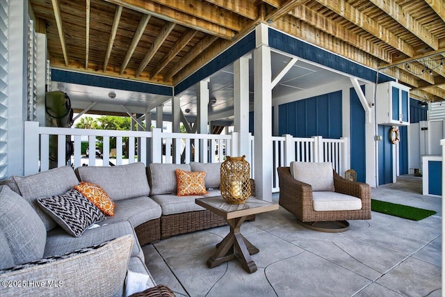 277 E Second St, Ocean Isle Beach, NC 28469 - view of patio / terrace featuring an outdoor hangout area
