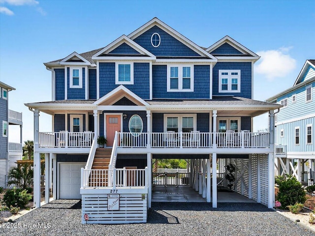 277 E Second St, Ocean Isle Beach, NC 28469 - beach home with covered porch, driveway, and stairs