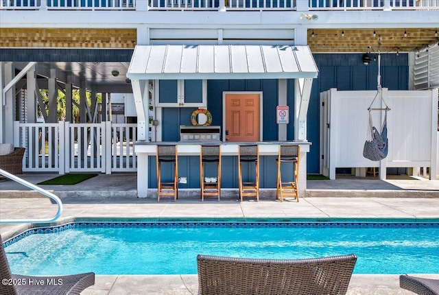 277 E Second St, Ocean Isle Beach, NC 28469 - swimming pool featuring a patio area