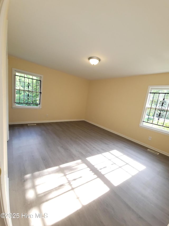 302 Bunche Dr, Goldsboro, NC 27530 - unfurnished room featuring wood finished floors and arched walkways