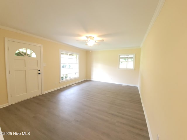302 Bunche Dr, Goldsboro, NC 27530 - entrance foyer with crown molding, wood finished floors, and ceiling fan