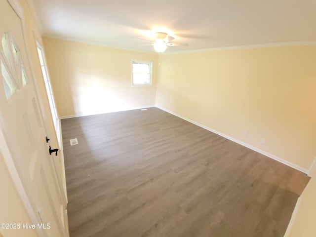 302 Bunche Dr, Goldsboro, NC 27530 - unfurnished room with ornamental molding, a ceiling fan, and wood finished floors
