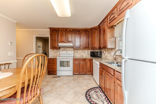 100 E Hedgelawn Way, Southern Pines, NC 28387 - kitchen featuring white appliances, under cabinet range hood, decorative backsplash, light stone counters, and ornamental molding