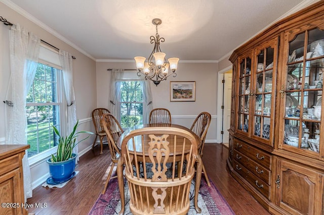 100 E Hedgelawn Way, Southern Pines, NC 28387 - dining space with healthy amount of natural light, a chandelier, dark wood-type flooring, and crown molding
