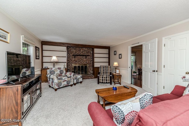 100 E Hedgelawn Way, Southern Pines, NC 28387 - living area featuring a brick fireplace, a textured ceiling, crown molding, and carpet floors