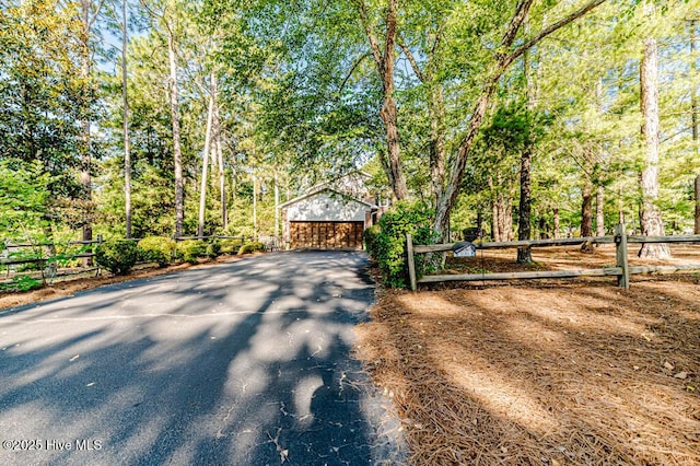 100 E Hedgelawn Way, Southern Pines, NC 28387 - view of front facade with an outbuilding and a detached garage