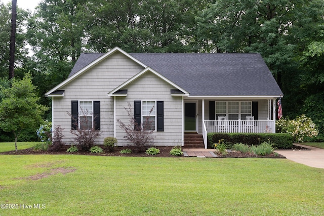 347 Stone Gate Dr, Greenville, NC 27858 - view of front of home with covered porch, a front lawn, and a shingled roof