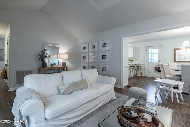 347 Stone Gate Dr, Greenville, NC 27858 - living area featuring dark wood finished floors and lofted ceiling