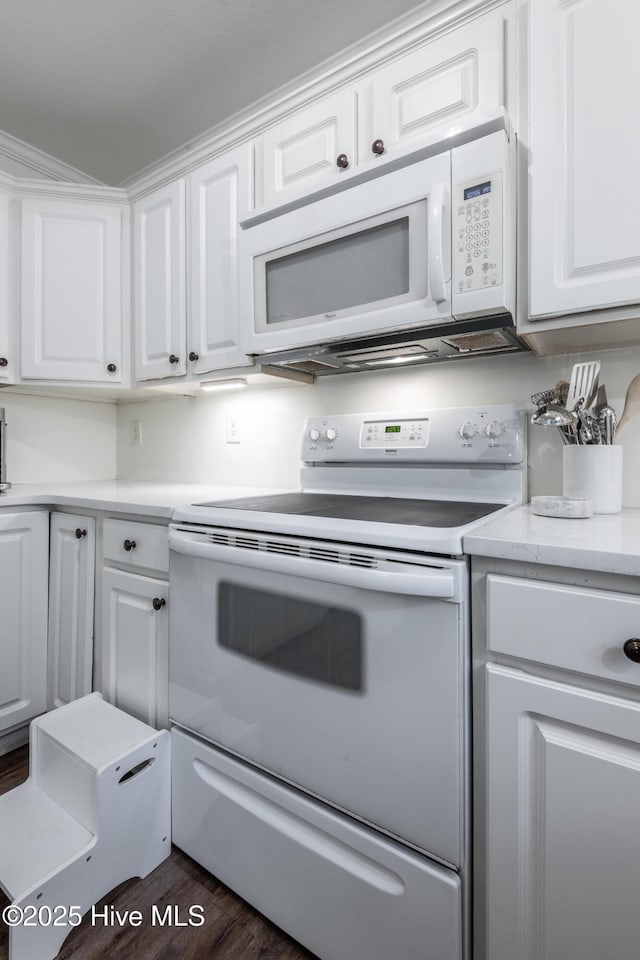 347 Stone Gate Dr, Greenville, NC 27858 - kitchen with white appliances, white cabinetry, light countertops, and dark wood-style floors
