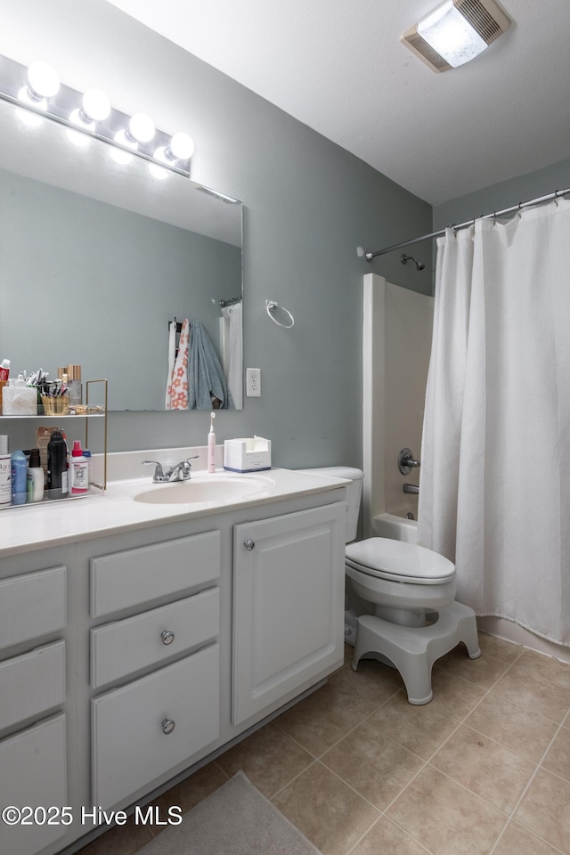 347 Stone Gate Dr, Greenville, NC 27858 - bathroom with vanity, tile patterned floors, and shower / bath combo with shower curtain