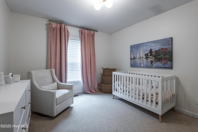 347 Stone Gate Dr, Greenville, NC 27858 - bedroom featuring carpet and a nursery area