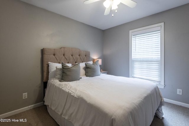 347 Stone Gate Dr, Greenville, NC 27858 - carpeted bedroom with multiple windows and ceiling fan
