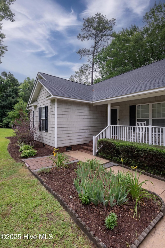 347 Stone Gate Dr, Greenville, NC 27858 - view of front of house with a porch and a shingled roof