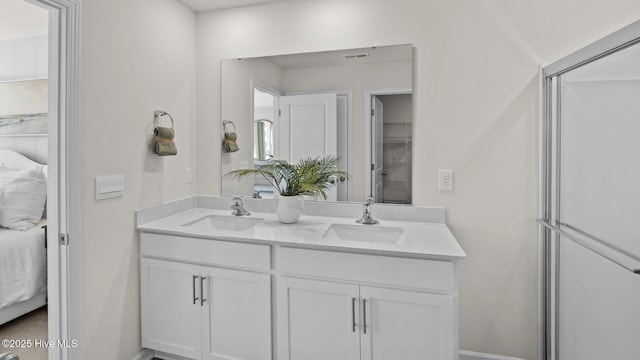 205 Wood St, La Grange, NC 28551 - ensuite bathroom featuring double vanity and baseboards