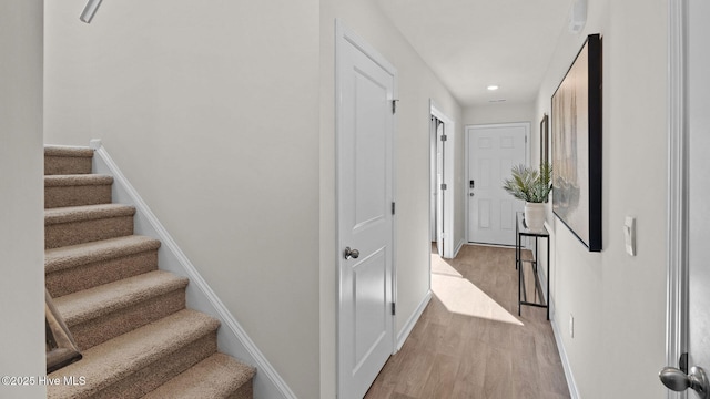 205 Wood St, La Grange, NC 28551 - corridor featuring light wood-type flooring and stairway