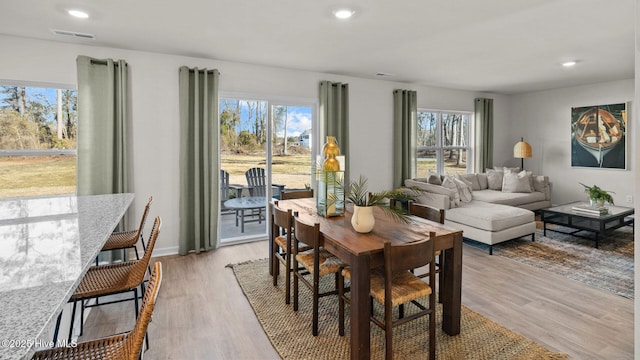 205 Wood St, La Grange, NC 28551 - dining room with healthy amount of natural light, light wood-style floors, and recessed lighting
