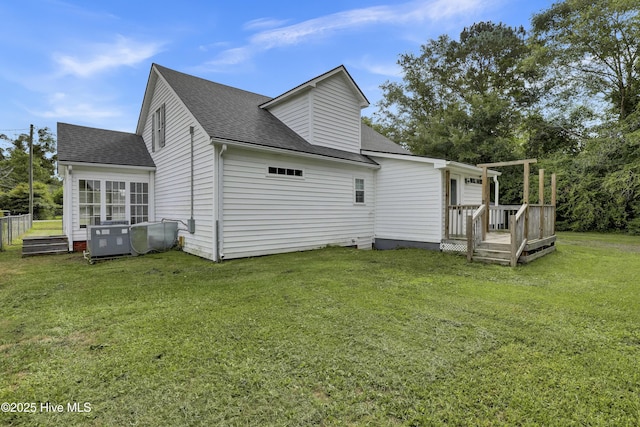 2971 Penderlea Hwy, Burgaw, NC 28425 - rear view of property featuring a deck, roof with shingles, and a lawn