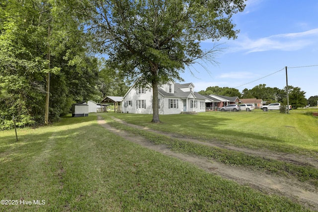 2971 Penderlea Hwy, Burgaw, NC 28425 - view of home's exterior featuring a yard and a storage unit