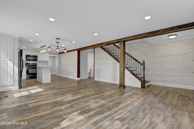 2971 Penderlea Hwy, Burgaw, NC 28425 - unfurnished living room with stairway, recessed lighting, and light wood-style flooring