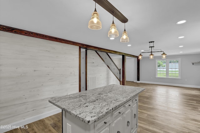 2971 Penderlea Hwy, Burgaw, NC 28425 - kitchen with white cabinetry, light wood-style flooring, recessed lighting, pendant lighting, and light stone countertops