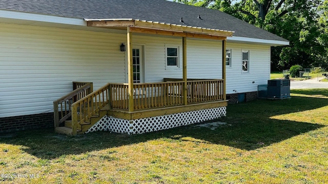 204 Mercer St, Goldsboro, NC 27530 - rear view of property featuring a lawn, a wooden deck, crawl space, and a shingled roof