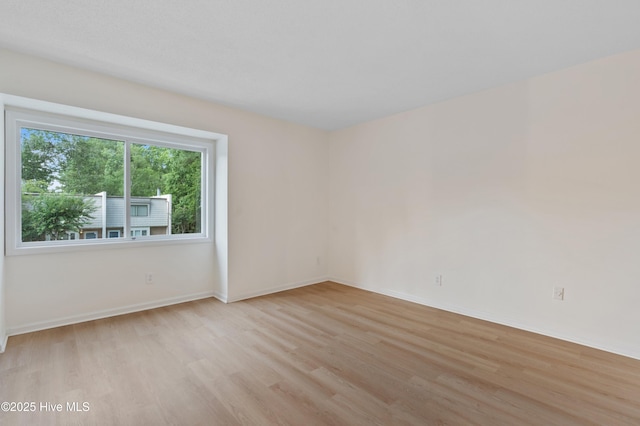 514 Cobblestone Dr, Wilmington, NC 28405 - empty room featuring light wood finished floors