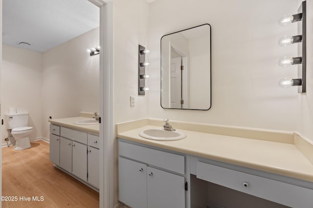 514 Cobblestone Dr, Wilmington, NC 28405 - bathroom featuring vanity and wood finished floors