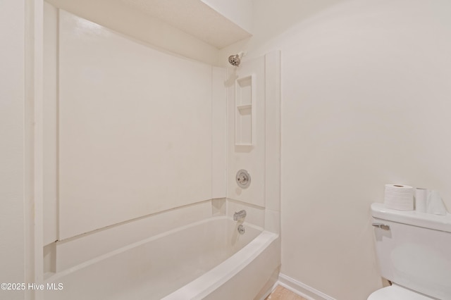 514 Cobblestone Dr, Wilmington, NC 28405 - bathroom featuring tub / shower combination and toilet
