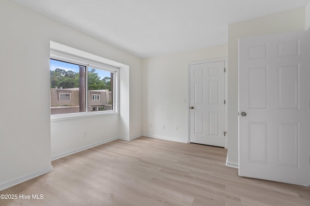 514 Cobblestone Dr, Wilmington, NC 28405 - empty room with light wood-type flooring and baseboards