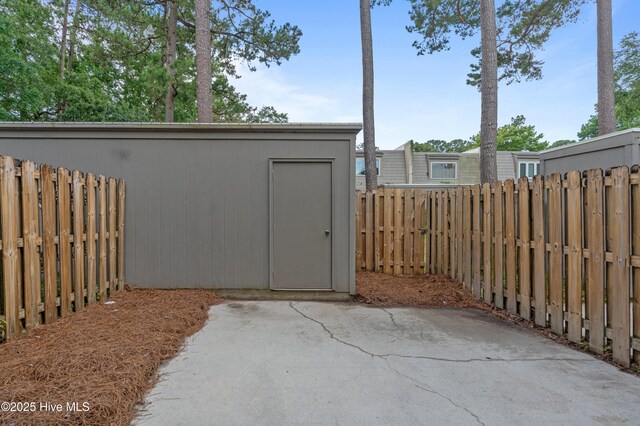 514 Cobblestone Dr, Wilmington, NC 28405 - view of shed with a fenced backyard