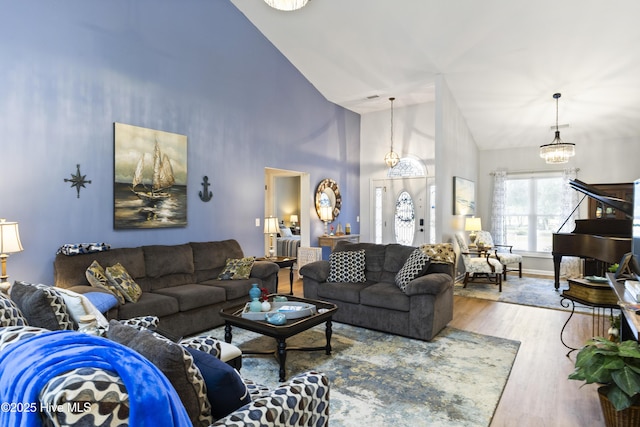 102 Crooked Gulley Cir, Sunset Beach, NC 28468 - living area with high vaulted ceiling and wood finished floors