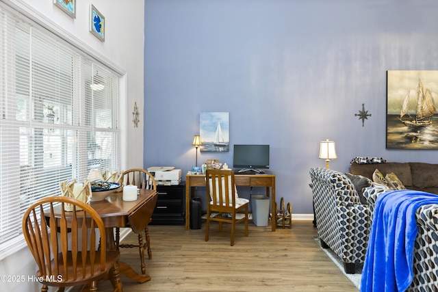 102 Crooked Gulley Cir, Sunset Beach, NC 28468 - home office with wood finished floors and a towering ceiling
