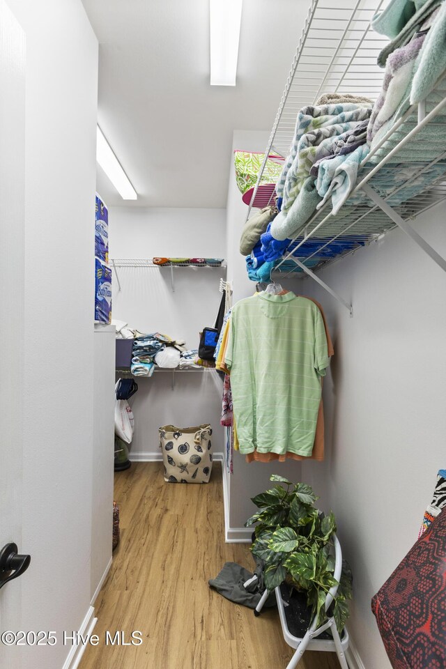 102 Crooked Gulley Cir, Sunset Beach, NC 28468 - spacious closet featuring wood finished floors