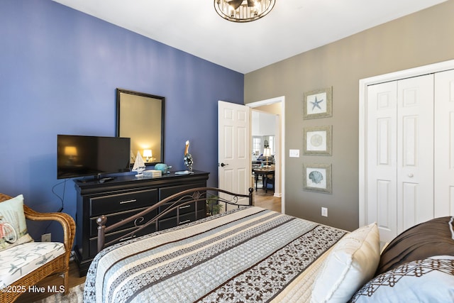 102 Crooked Gulley Cir, Sunset Beach, NC 28468 - bedroom with a closet and wood finished floors