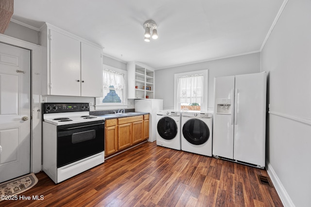 302 Roanoke Trl, Edenton, NC 27932 - washroom featuring washer and dryer, dark wood-style flooring, and crown molding