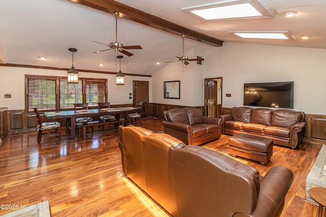 108 Perry Dr, Goldsboro, NC 27530 - living room with light wood-style floors, wainscoting, and a ceiling fan