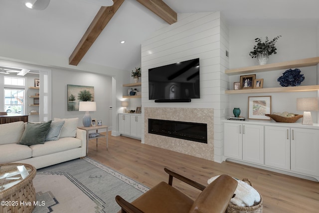 4139 Cobleskill Dr, Leland, NC 28451 - living room with light wood finished floors, a glass covered fireplace, and recessed lighting