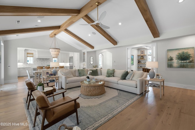 4139 Cobleskill Dr, Leland, NC 28451 - living room with light wood-type flooring, ceiling fan, recessed lighting, and arched walkways