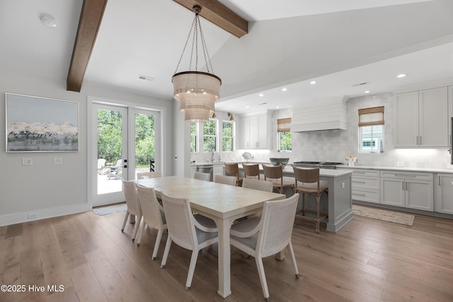 4139 Cobleskill Dr, Leland, NC 28451 - dining space with light wood-style floors, a chandelier, and recessed lighting