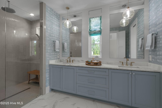 4139 Cobleskill Dr, Leland, NC 28451 - bathroom with double vanity, walk in shower, and marble look tiles