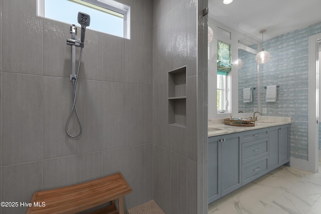 4139 Cobleskill Dr, Leland, NC 28451 - full bath with marble look tiles, double vanity, and tiled shower